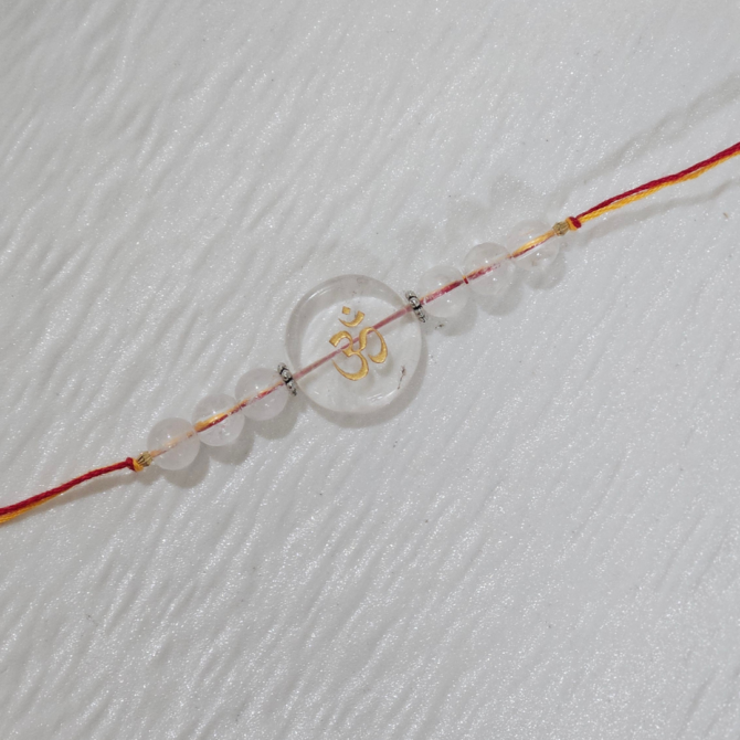 Clear Quartz OM Engraved Rakhi